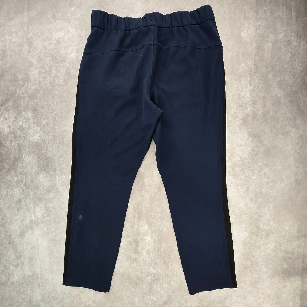 Lululemon Athletica On the Fly Woven Navy with Black Track Stripe Pants